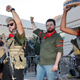 Members of the John Brown Gun Club and Redneck Revolt protest outside the Phoenix Convention Center on Aug. 22, 2017, in Phoenix. (Matt York/AP Images)